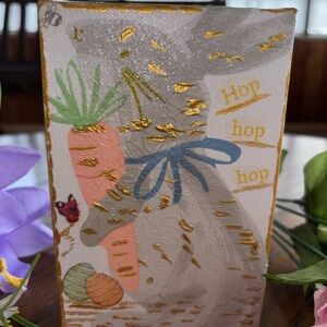 Hand crafted Easter bunny decoupage art.